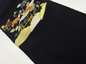 綴れ鶴に椿・雪輪模様織出し名古屋帯